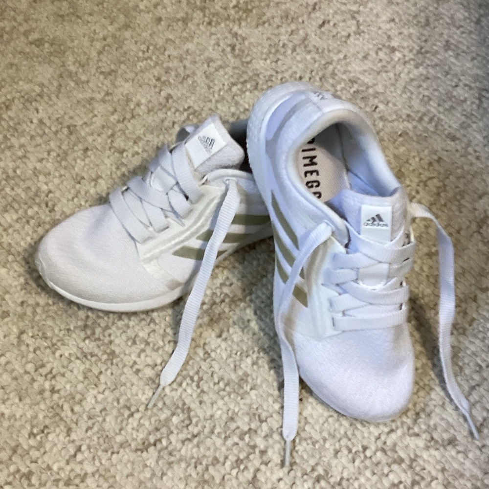 Adidas White Sneakers with Gold Stripes